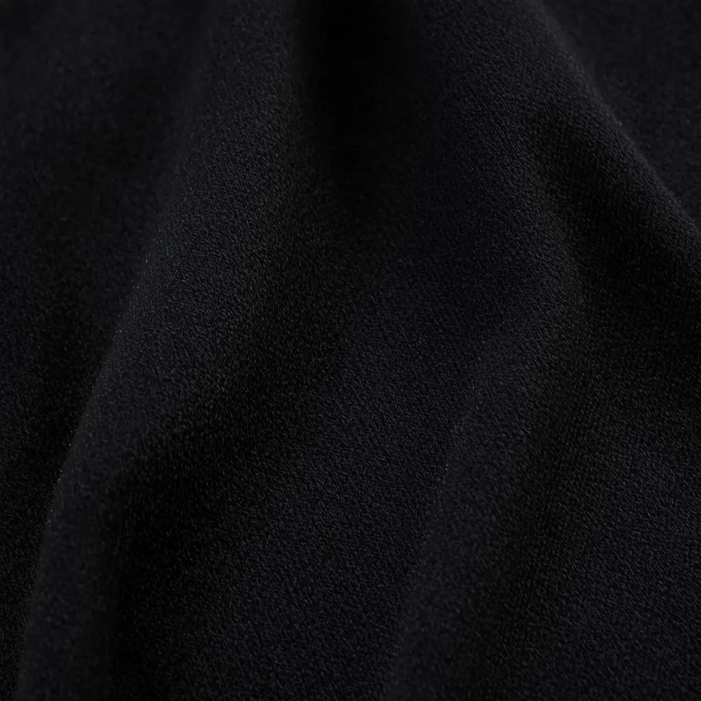 Hyper-realistic extreme close-up of a 180 GSM cotton fabric t-shirt, highlighting thread count and structure with scientific precision. Each fibre is visible, showing medium-weight knit density typical of high- (5).webp