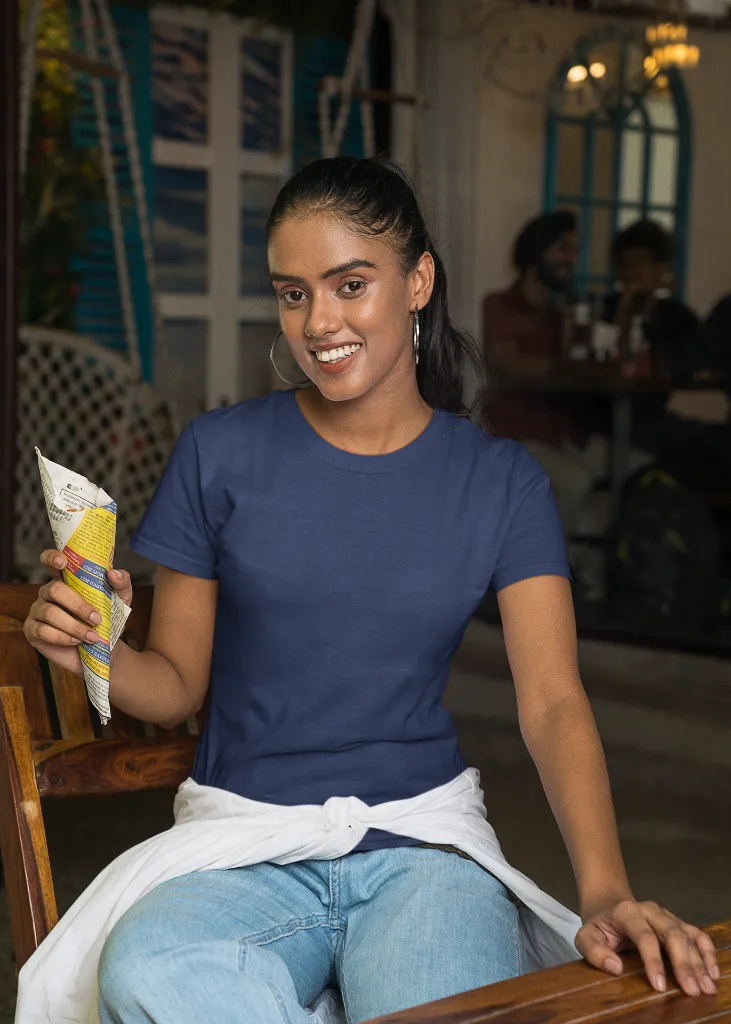 gildan-t-shirt-mockup-of-a-smiling-woman-posing-with-an-indian-snack-m30305 (1).webp