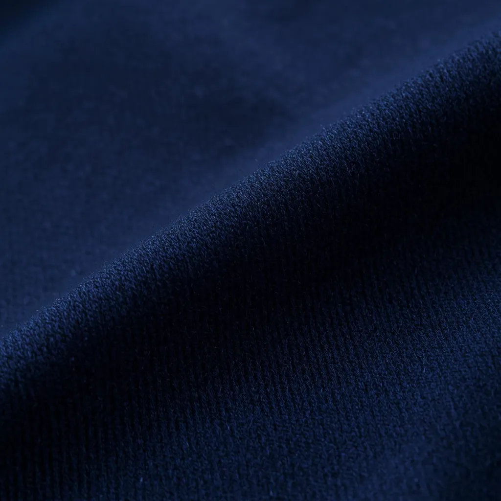 Hyper-realistic extreme close-up of a 180 GSM cotton fabric t-shirt, highlighting thread count and structure with scientific precision. Each fibre is visible, showing medium-weight knit density typical of high- (4).webp