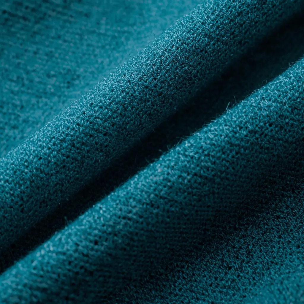 Hyper-realistic extreme close-up of a 180 GSM cotton fabric t-shirt, highlighting thread count and structure with scientific precision. Each fibre is visible, showing medium-weight knit density typical of high- (3).webp