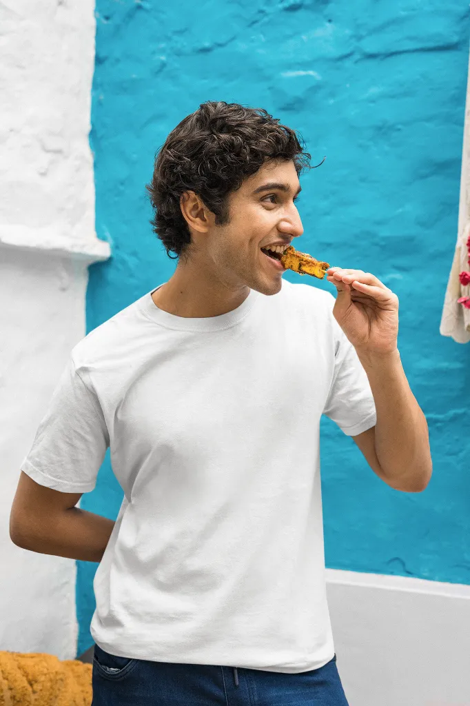gildan-t-shirt-mockup-of-a-man-eating-a-street-food-snack-m30295 (2).webp