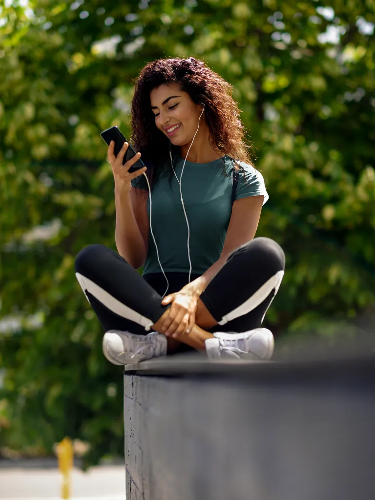 t-shirt-mockup-of-a-young-woman-looking-at-her-phone-38861-r-el2 (4).webp