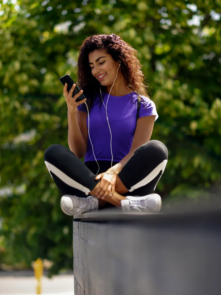 t-shirt-mockup-of-a-young-woman-looking-at-her-phone-38861-r-el2 (5).webp