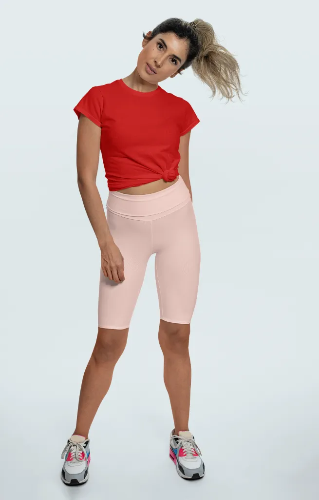 sublimated-bike-shorts-mockup-of-a-woman-wearing-a-knotted-t-shirt-at-a-studio-42304 (6).webp