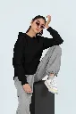 pullover-hoodie-mockup-of-a-woman-sitting-on-a-cube-while-wearing-sunglasses-m53089.webp