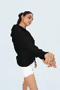 mockup-of-a-woman-wearing-a-hoodie-with-a-customizable-sleeve-and-rings-on-her-hand-m53080.webp