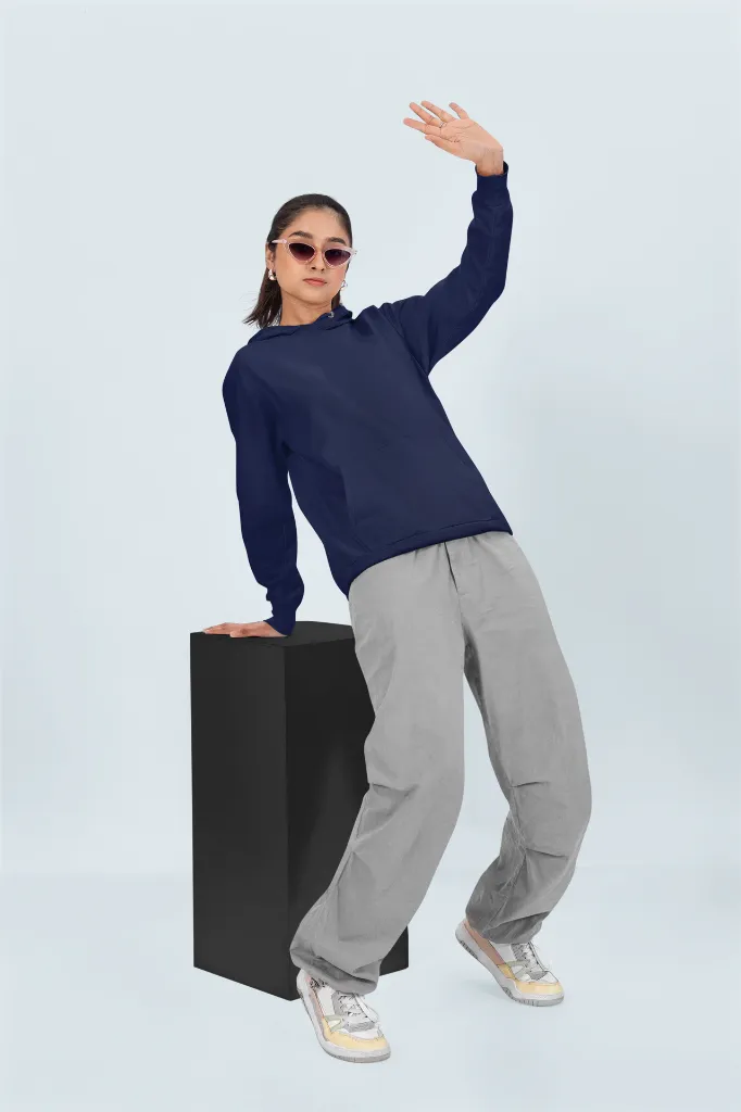 pullover-hoodie-mockup-featuring-a-woman-striking-a-pose-in-a-studio-with-a-colorful-background-m53090 (2).webp