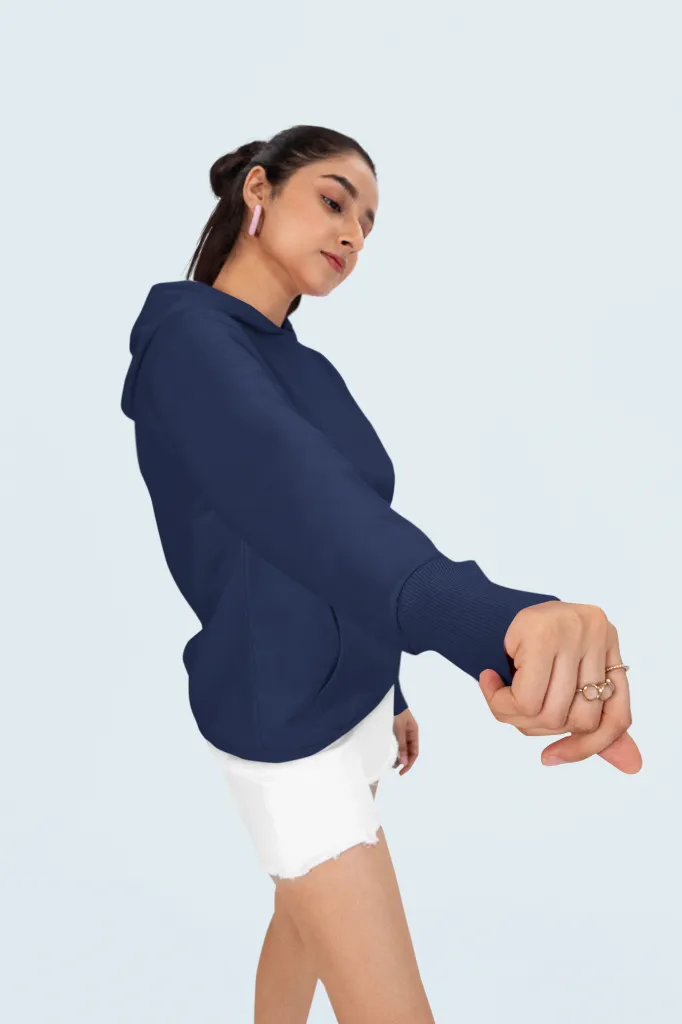 mockup-of-a-woman-wearing-a-hoodie-with-a-customizable-sleeve-and-rings-on-her-hand-m53080 (2).webp