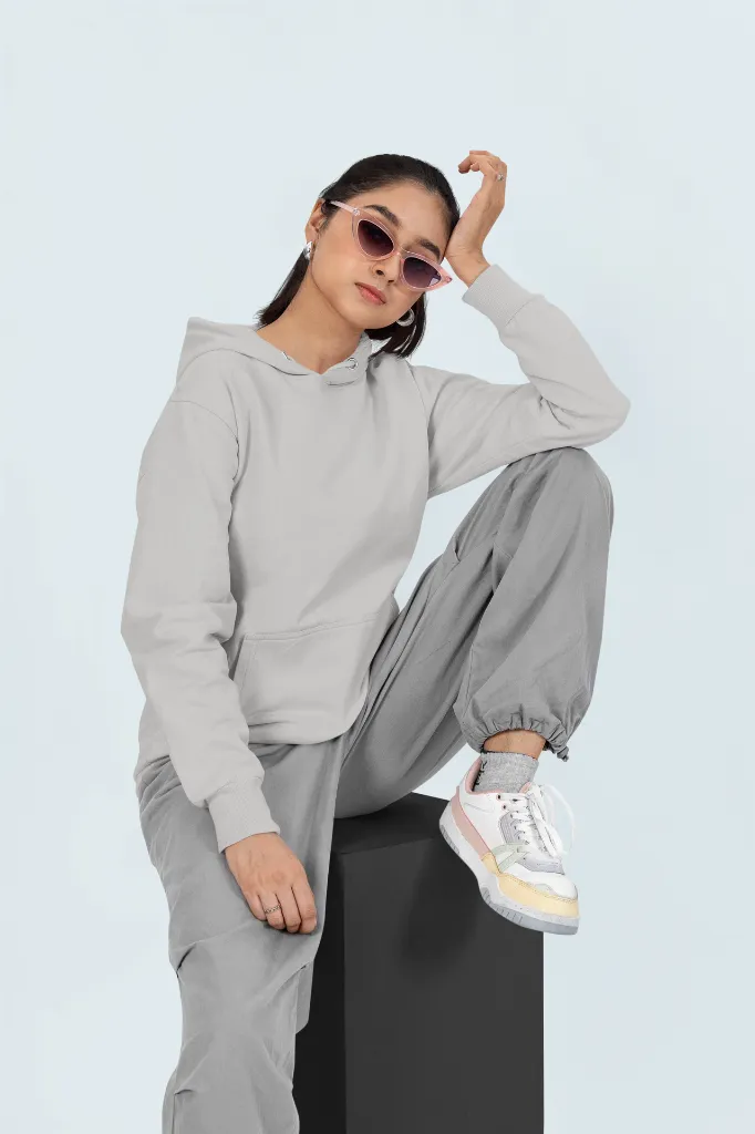 pullover-hoodie-mockup-of-a-woman-sitting-on-a-cube-while-wearing-sunglasses-m53089 (1).webp