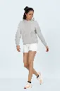 pullover-hoodie-mockup-featuring-a-woman-walking-in-a-studio-with-a-serious-look-m53077.webp