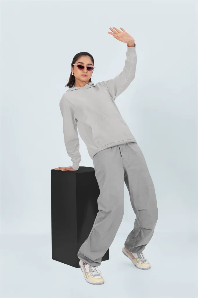 pullover-hoodie-mockup-featuring-a-woman-striking-a-pose-in-a-studio-with-a-colorful-background-m53090 (1).webp