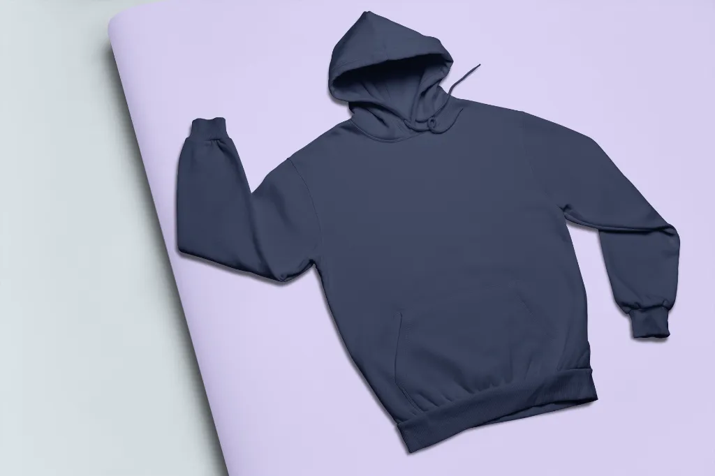 mockup-of-a-hoodie-lying-on-a-pasteboard-24379 (1).webp