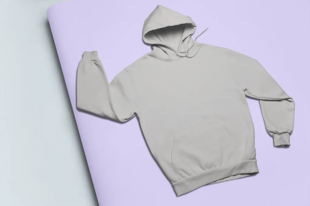 mockup-of-a-hoodie-lying-on-a-pasteboard-24379 (2).webp