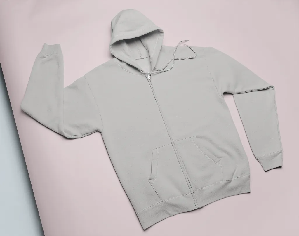 flat-lay-mockup-of-a-full-zip-hoodie-on-colored-cardboard-24370.webp