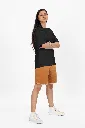 oversized-t-shirt-mockup-of-a-woman-with-arms-crossed-standing-in-a-studio-m53046 (4).webp