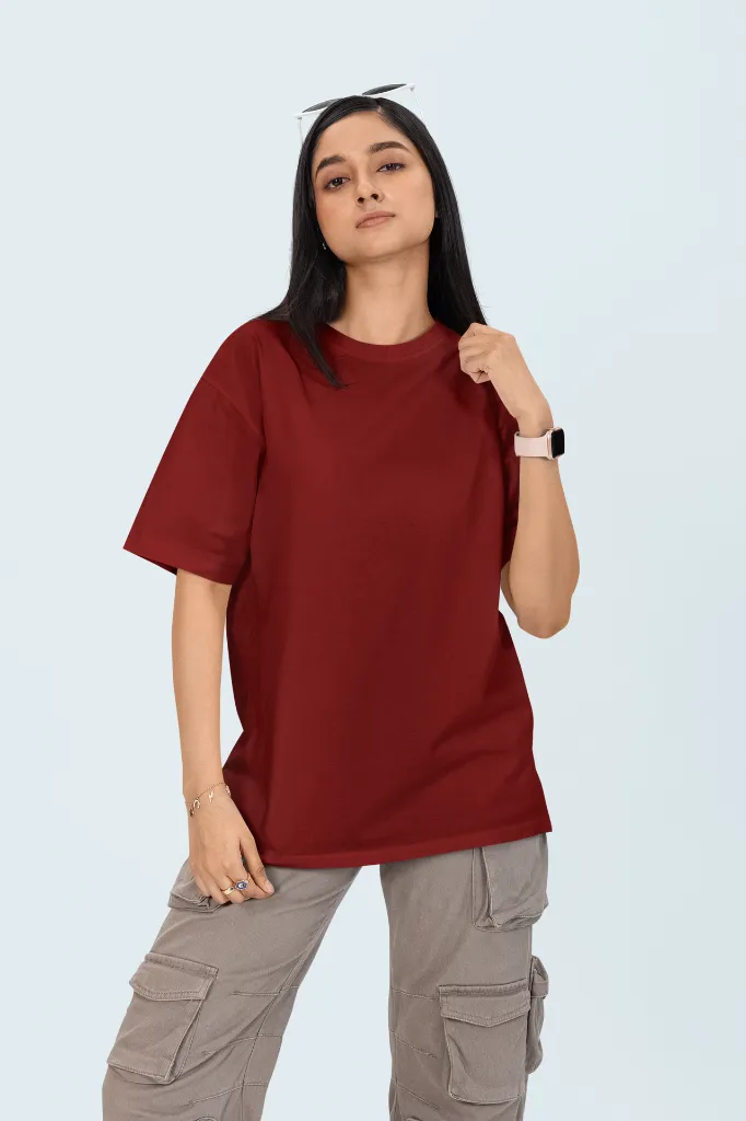 oversized-round-neck-tee-mockup-featuring-a-woman-standing-against-a-colorful-backdrop-m53034 (3).webp