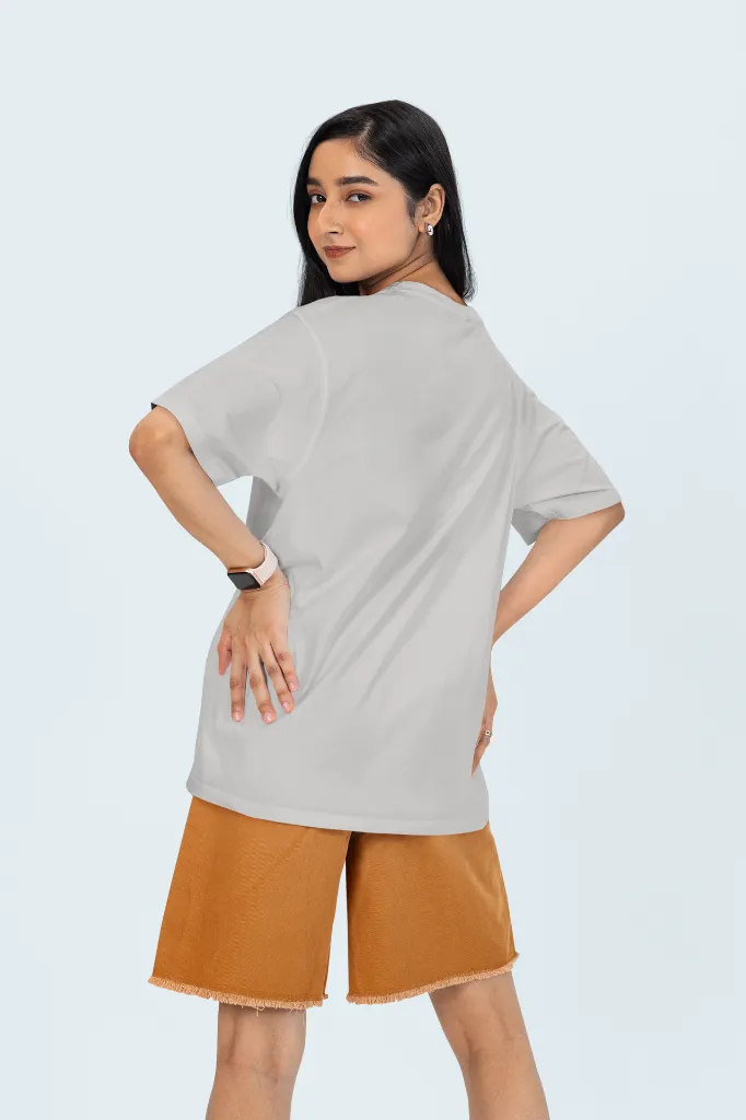 back-view-oversized-tee-mockup-of-a-woman-posing-in-a-studio-against-a-colorful-background-m53045 (2).webp