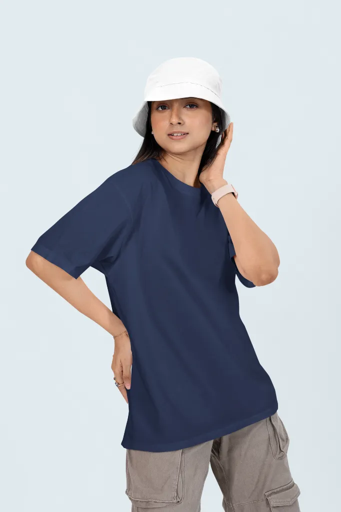 oversized-t-shirt-mockup-of-a-woman-posing-in-a-customizable-background-with-a-bucket-hat-m53042 (1).webp