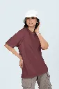 oversized-t-shirt-mockup-of-a-woman-posing-in-a-customizable-background-with-a-bucket-hat-m53042.webp