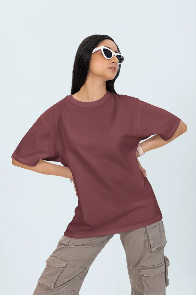 oversized-t-shirt-mockup-featuring-a-woman-with-cool-glasses-posing-with-her-hands-on-her-waist-m53033.webp