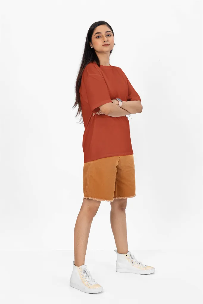 oversized-t-shirt-mockup-of-a-woman-with-arms-crossed-standing-in-a-studio-m53046 (5).webp