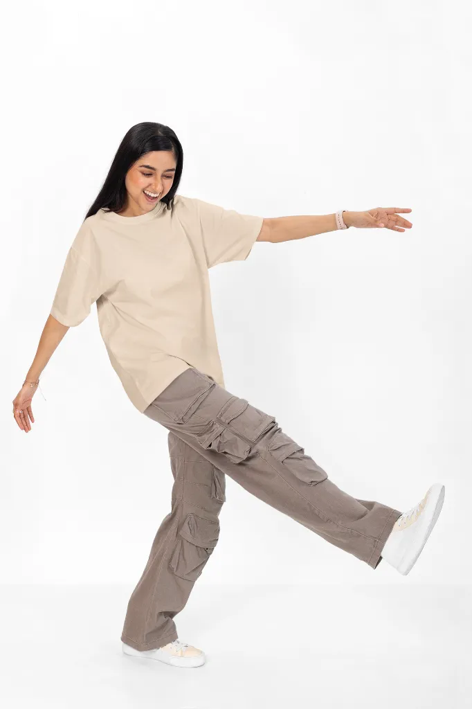 oversized-tee-mockup-featuring-a-cheerful-woman-having-fun-in-a-studio-m53035 (7).webp