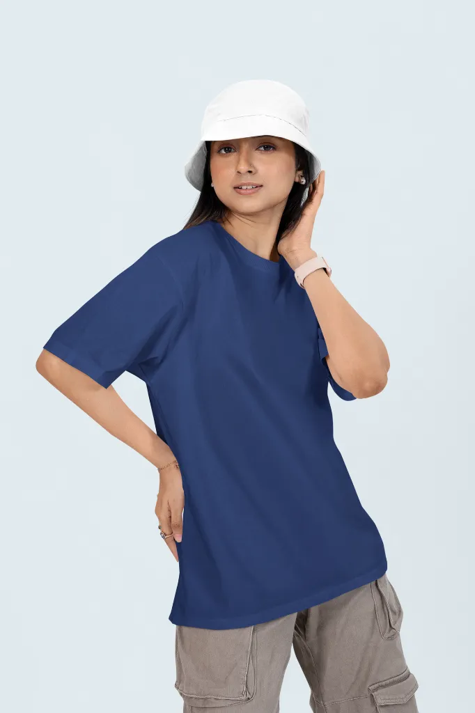 oversized-t-shirt-mockup-of-a-woman-posing-in-a-customizable-background-with-a-bucket-hat-m53042 (6).webp
