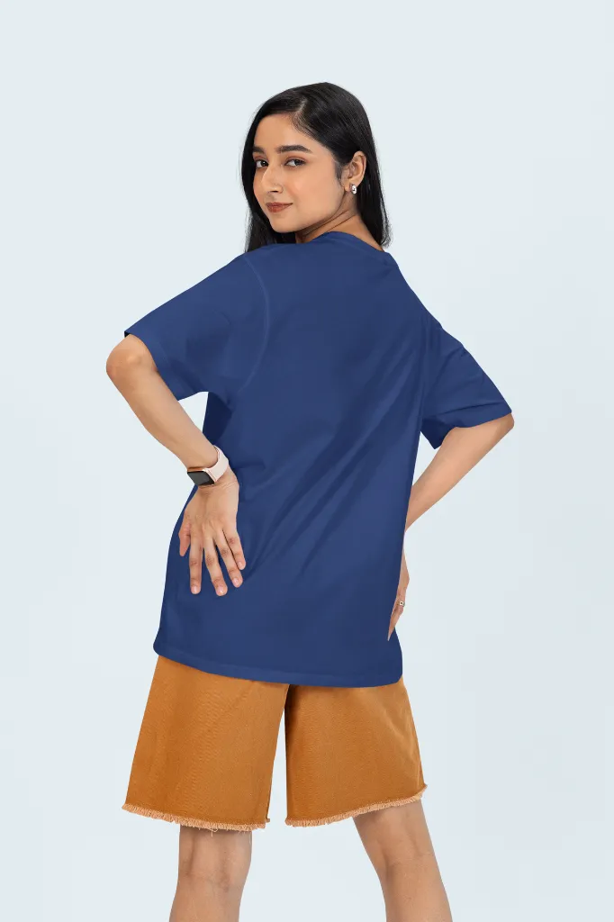 back-view-oversized-tee-mockup-of-a-woman-posing-in-a-studio-against-a-colorful-background-m53045 (6).webp