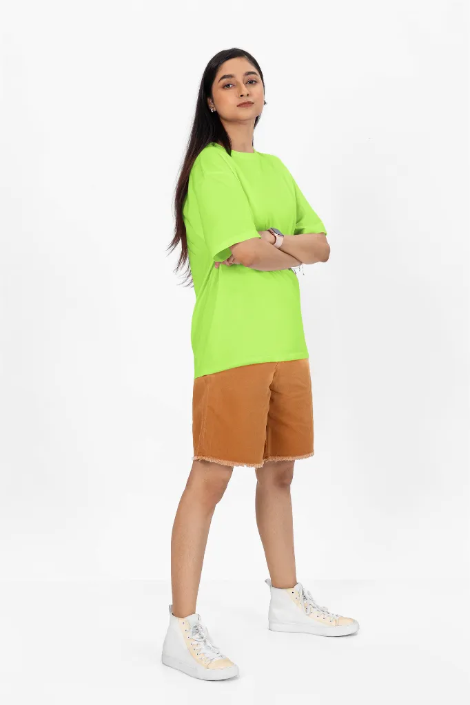 oversized-t-shirt-mockup-of-a-woman-with-arms-crossed-standing-in-a-studio-m53046 (9).webp