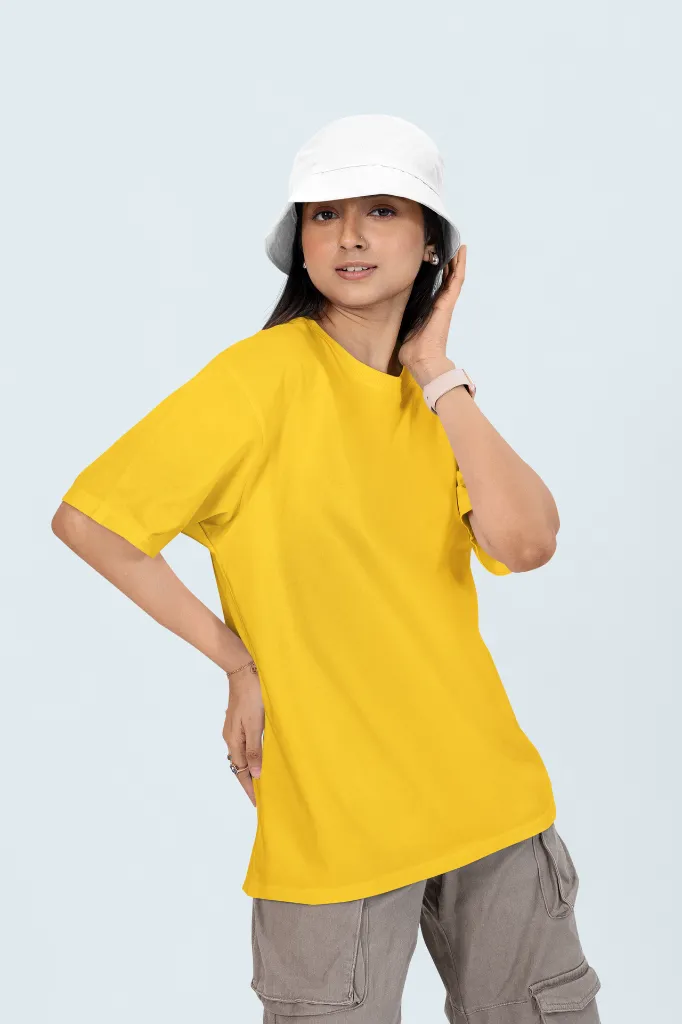 oversized-t-shirt-mockup-of-a-woman-posing-in-a-customizable-background-with-a-bucket-hat-m53042 (11).webp