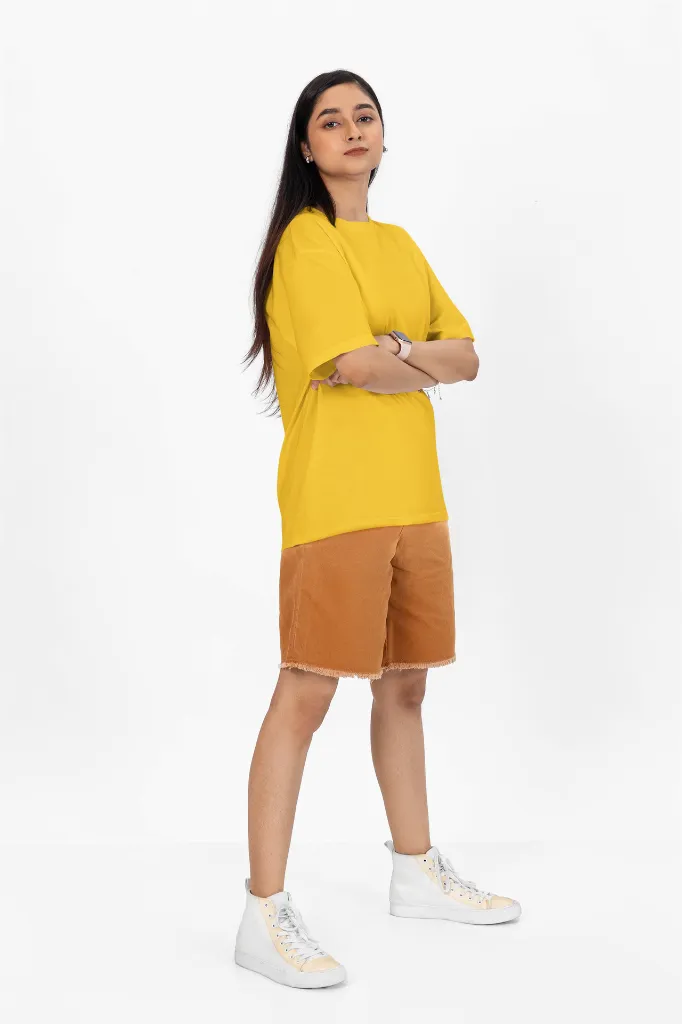 oversized-t-shirt-mockup-of-a-woman-with-arms-crossed-standing-in-a-studio-m53046 (11).webp
