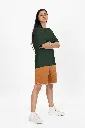 oversized-t-shirt-mockup-of-a-woman-with-arms-crossed-standing-in-a-studio-m53046 (8).webp