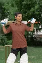 cricket-themed-mockup-featuring-a-woman-wearing-a-gildan-polo-shirt-m39964.webp