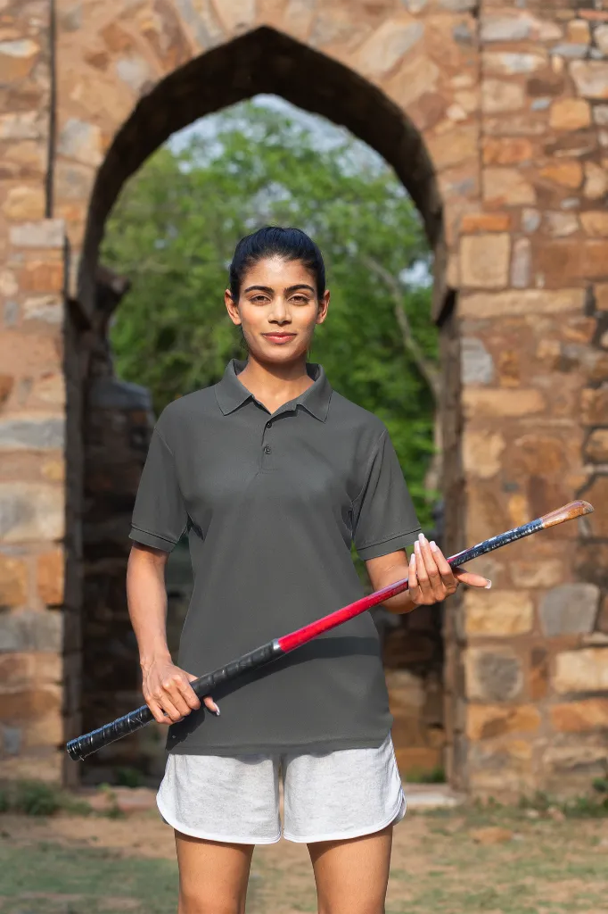 gildan-polo-shirt-mockup-of-a-woman-wearing-a-cricket-s-team-uniform-m39932 (3).webp