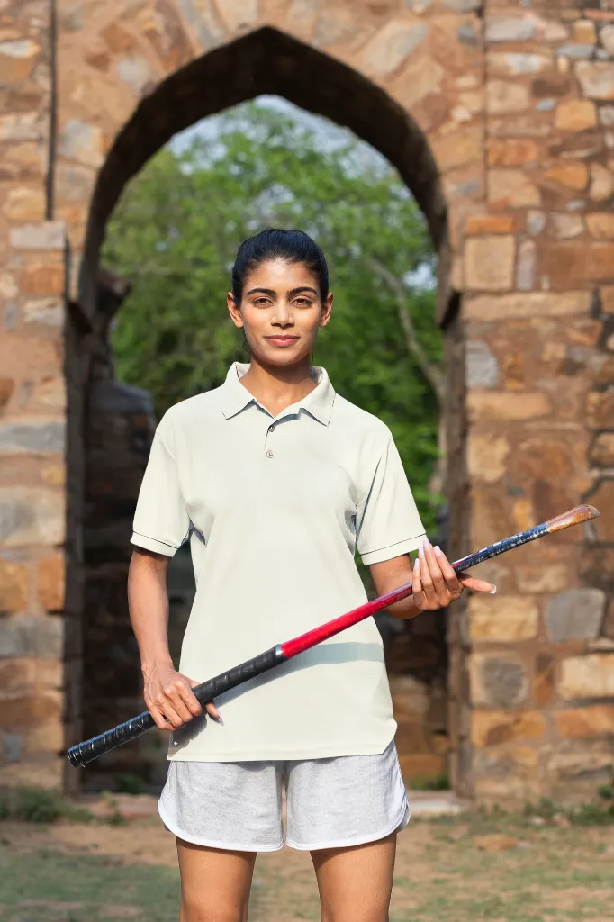 gildan-polo-shirt-mockup-of-a-woman-wearing-a-cricket-s-team-uniform-m39932 (4).webp