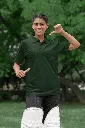 cricket-themed-mockup-of-a-happy-woman-pointing-at-her-gildan-polo-shirt-m39966 (7).webp