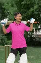 cricket-themed-mockup-featuring-a-woman-wearing-a-gildan-polo-shirt-m39964 (8).webp