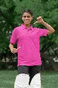 cricket-themed-mockup-of-a-happy-woman-pointing-at-her-gildan-polo-shirt-m39966 (8).webp