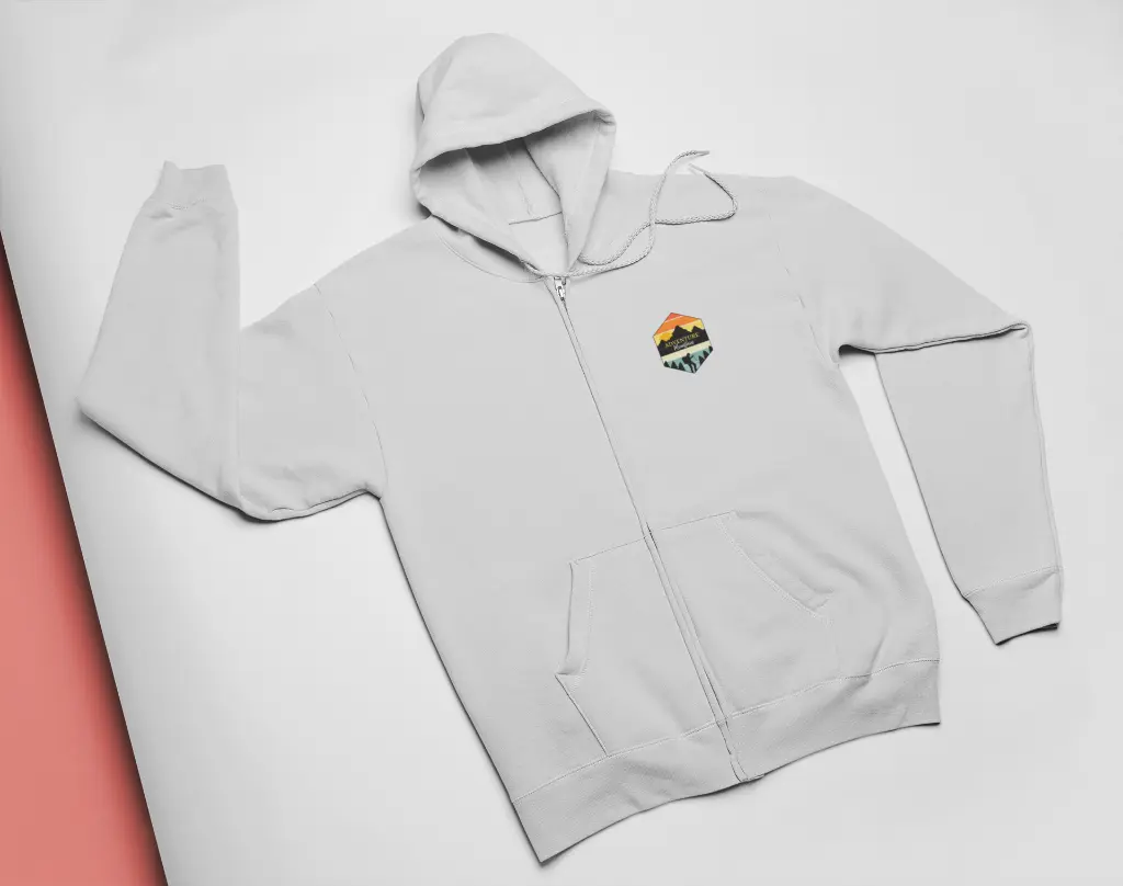 flat-lay-mockup-of-a-full-zip-hoodie-on-colored-cardboard-24370 (2).webp