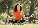 t-shirt-mockup-of-a-young-woman-with-curly-hair-meditating-in-the-park-35285-r-el2 (6).webp