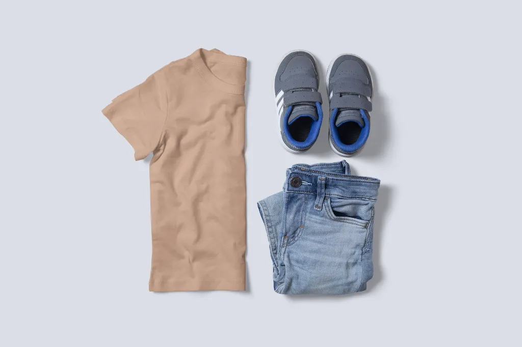 t-shirt-mockup-of-a-boy-s-outfit-on-a-customizable-surface-3000-el1.webp